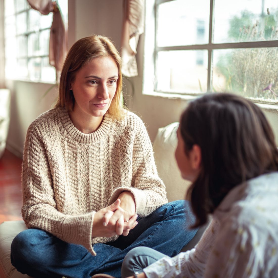 woman talking to child